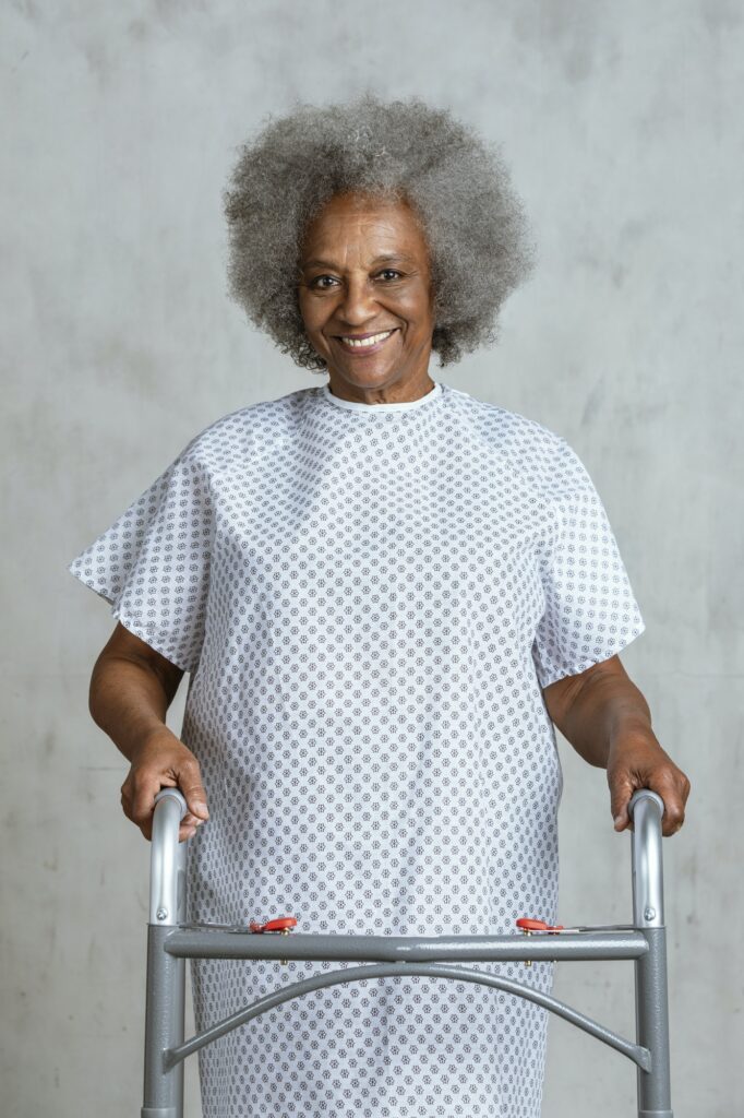 Black woman with a zimmer frame